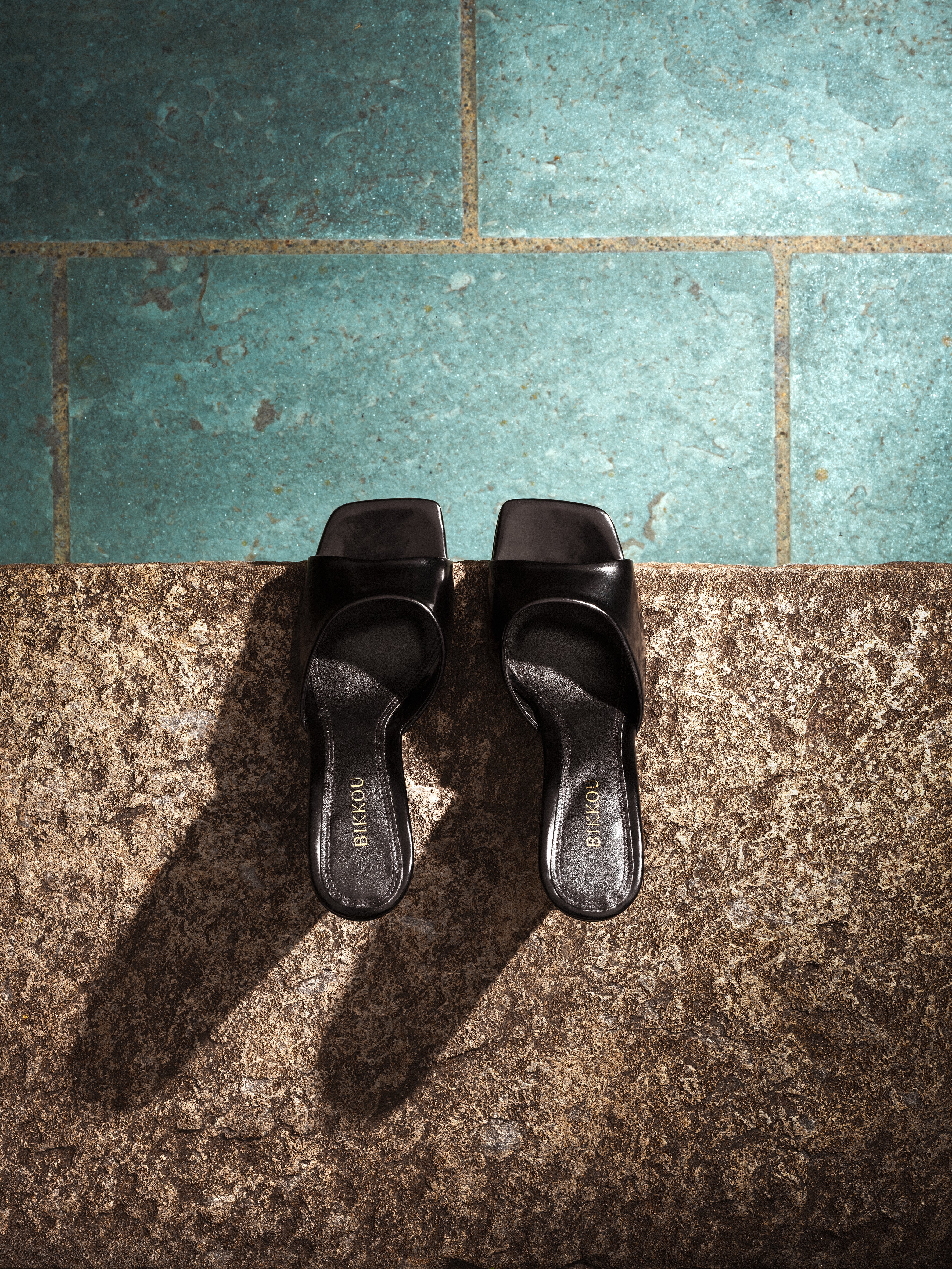 BIKKOU 1AM TOO PRETTY TO LEAVE BLACK vegan wedge heel on ground